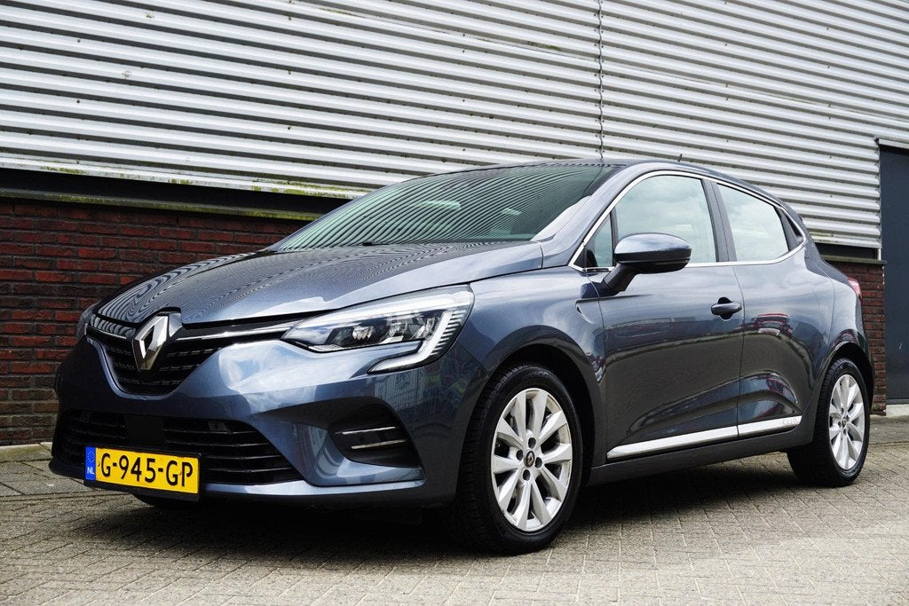 Renault Clio 1.0 TCe Intens/Half leer/Groot navigatie/Carpla, Auto's, Gebruikt, Euro 6, 580 kg, Origineel Nederlands