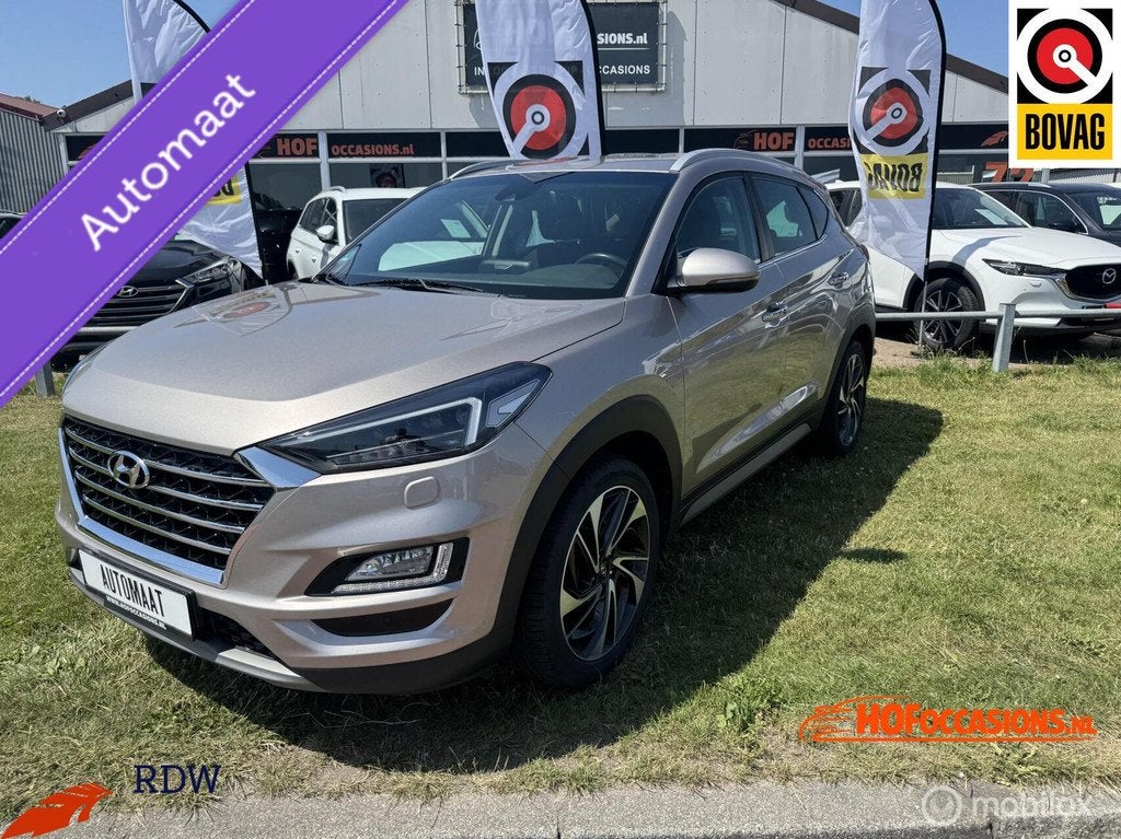 Hyundai Tucson 1.6 T-GDI 4WD Premium AUTOMAAT/CARPLAY/TREKHA, Auto's, Hyundai, Automaat, Stof, Gebruikt, 4 cilinders