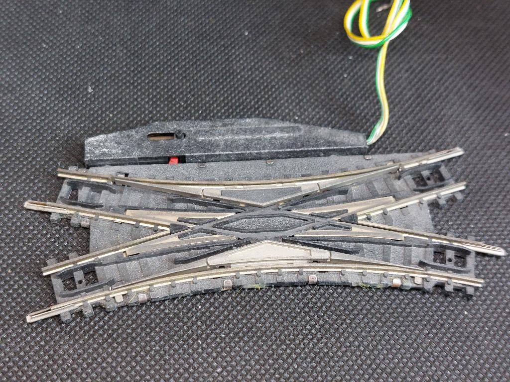 Minitrix 4968 - Kruiswissel elektr. 104,2mm. 30 gr. (14666), Gebruikt, Gelijkstroom, Trix, Rails