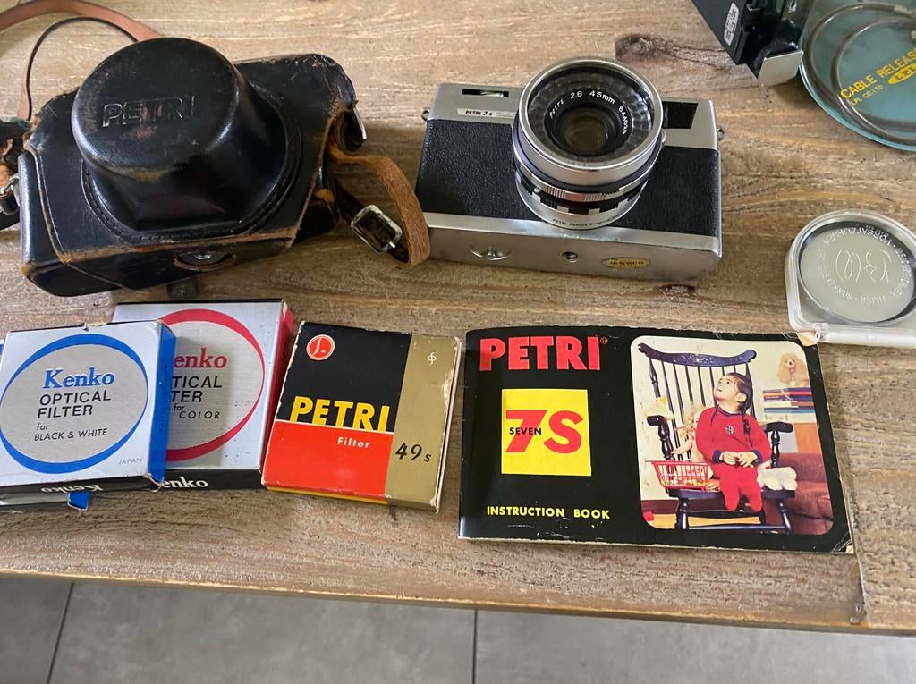 Oude petri 7s camera set met boekjes enz, Ophalen of Verzenden, Zo goed als nieuw, Spiegelreflex, Overige Merken