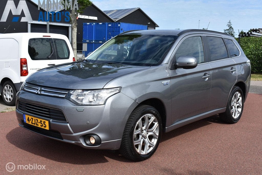 Mitsubishi Outlander 2.0 PHEV Executive Edition *EXPORT!*, Auto's, Mitsubishi, 4 cilinders, Leder en Stof, Origineel Nederlands