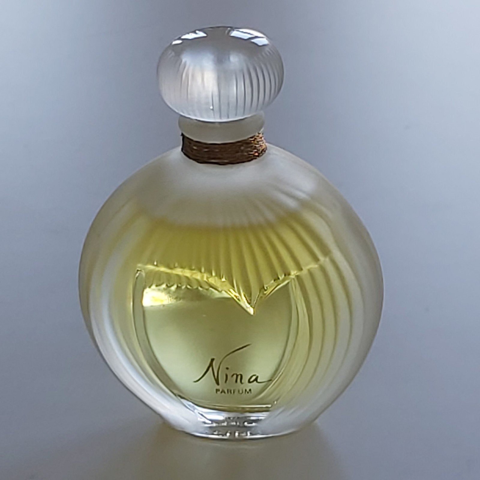 Parfum Nina van Nina Ricci - 15 ml, Ophalen of Verzenden, Zo goed als nieuw, Miniatuur, Gevuld
