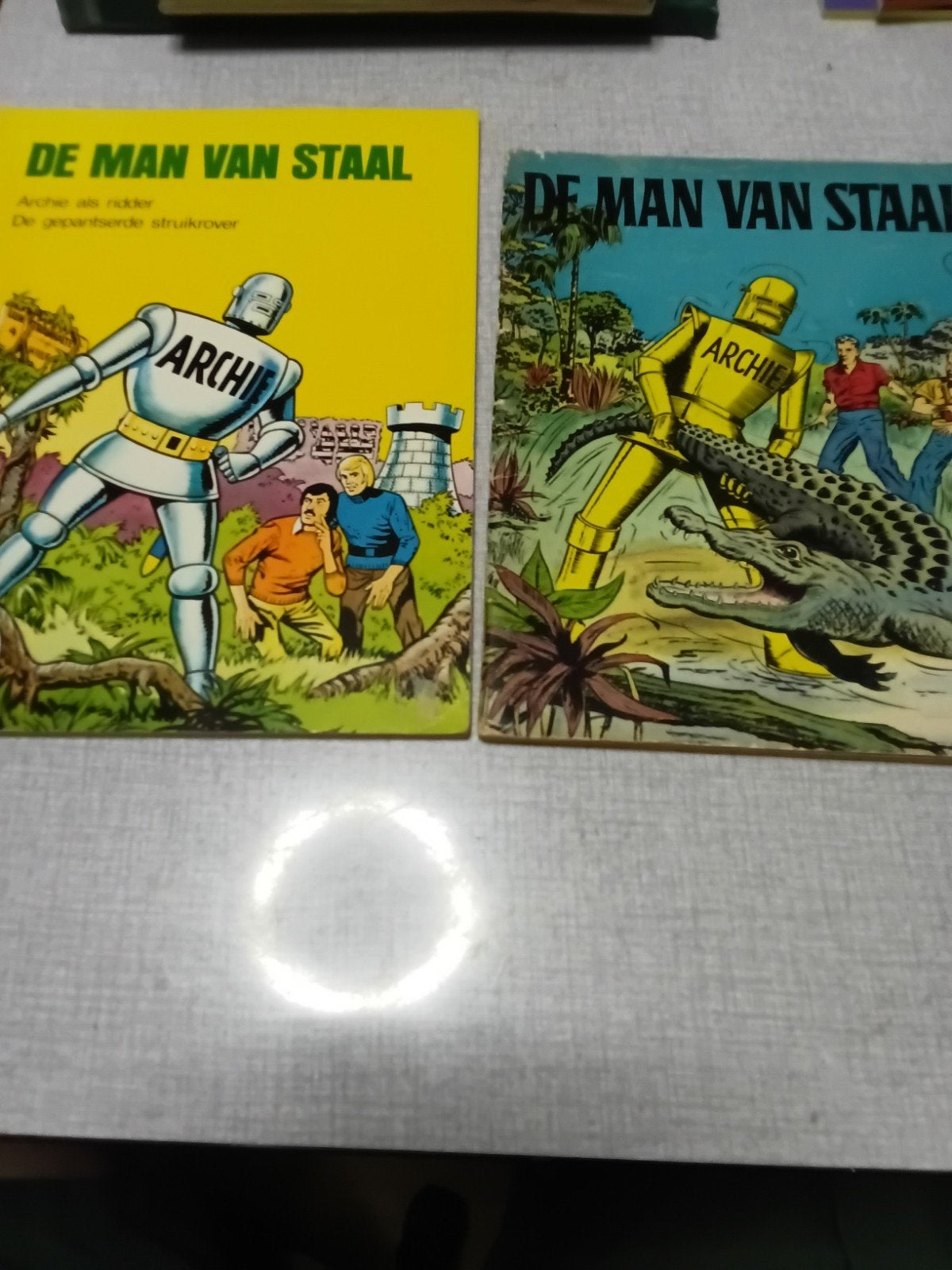 2 stripboeken van De Man Van Staal., Meerdere stripboeken, Ophalen, Gelezen