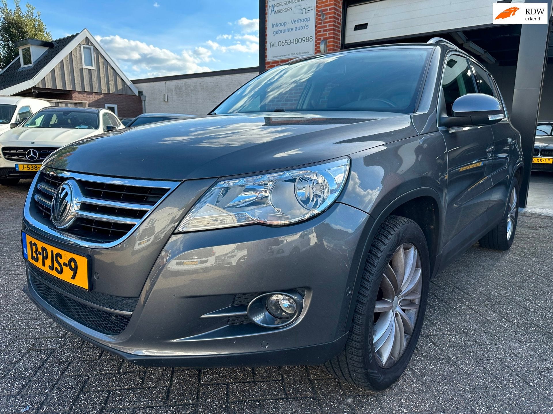 Volkswagen Tiguan 2.0 TSI Sport&Style 4Motion AUTOMAAT-LEDER, Automaat, Gebruikt, Zwart, 4 cilinders