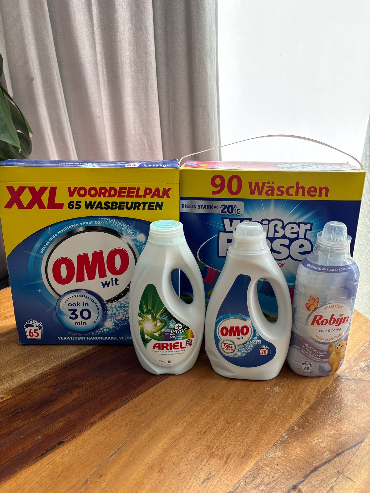 Omo/Witte reus/Ariel wasmiddel, Ophalen