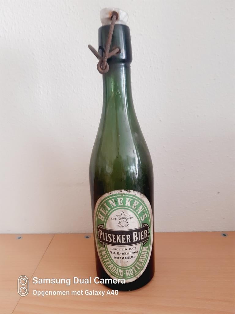 Mooie Heineken.s pilsener bier fles Amsterdam Rotterdam, Ophalen of Verzenden, Zo goed als nieuw, Glas of Glazen, Heineken