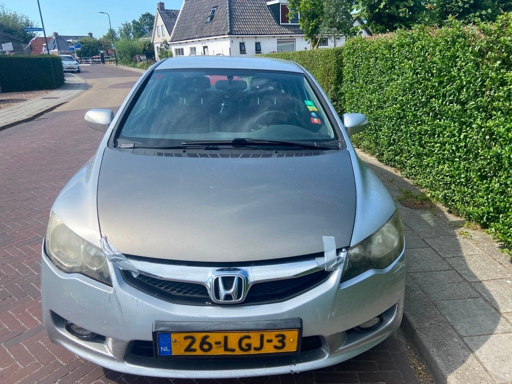 Honda Civic 1.3 95pk CVT 2010 Grijs, Auto's, Honda, Euro 5, Stof, Zwart, Origineel Nederlands