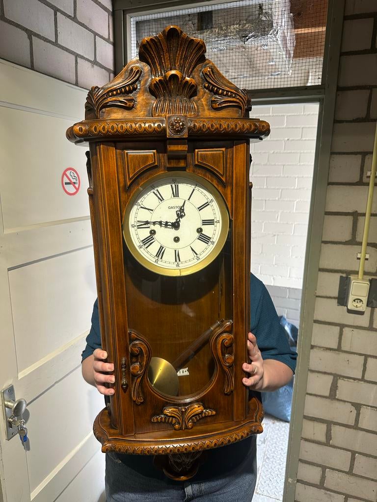 Antieke Gaston wandklok met slinger, Ophalen