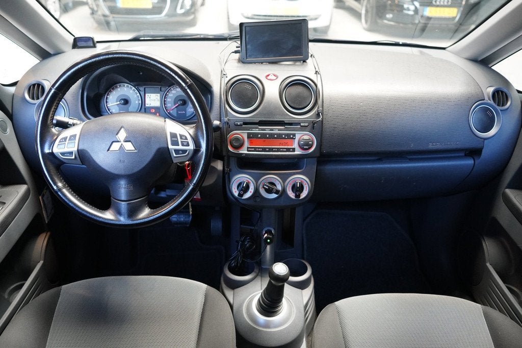 Mitsubishi Colt 1.3 Edition Two | AUT | AIRCO | PDC | CRUISE, Auto's, Mitsubishi, Euro 5, Stof, Gebruikt, 31 €/maand