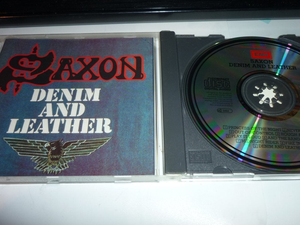 Saxon - Denim And Leather CD, Cd's en Dvd's, Inclusief boekje, Verzenden, Hardrock, Zo goed als nieuw