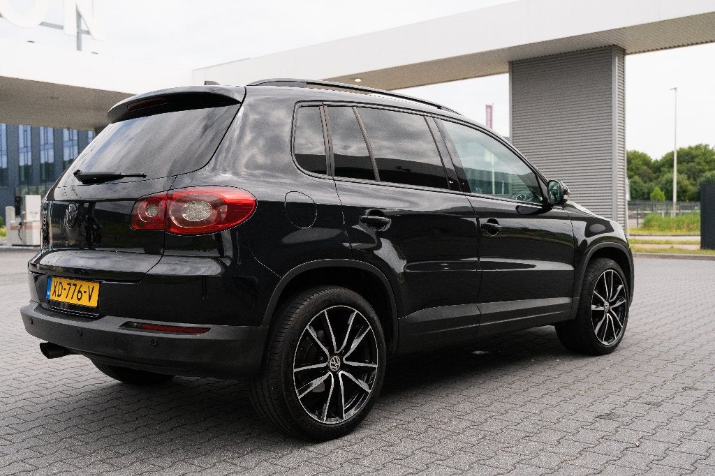 Volkswagen Tiguan 1.4 TSI 110KW 4MOTION 2010 Zwart, Auto's, 13 km/l, Stof, Zwart, 4 cilinders
