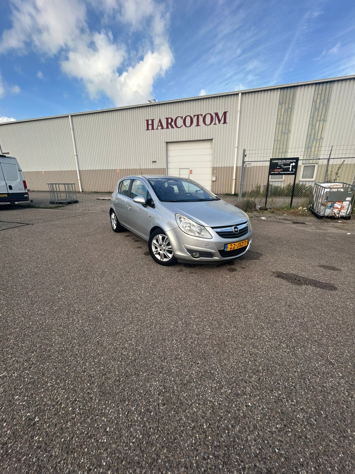 Opel Corsa 1.4 16V 5D 2009 Grijs, Auto's, Opel, Voorwielaandrijving, 1063 kg, 4 cilinders, Parkeersensor