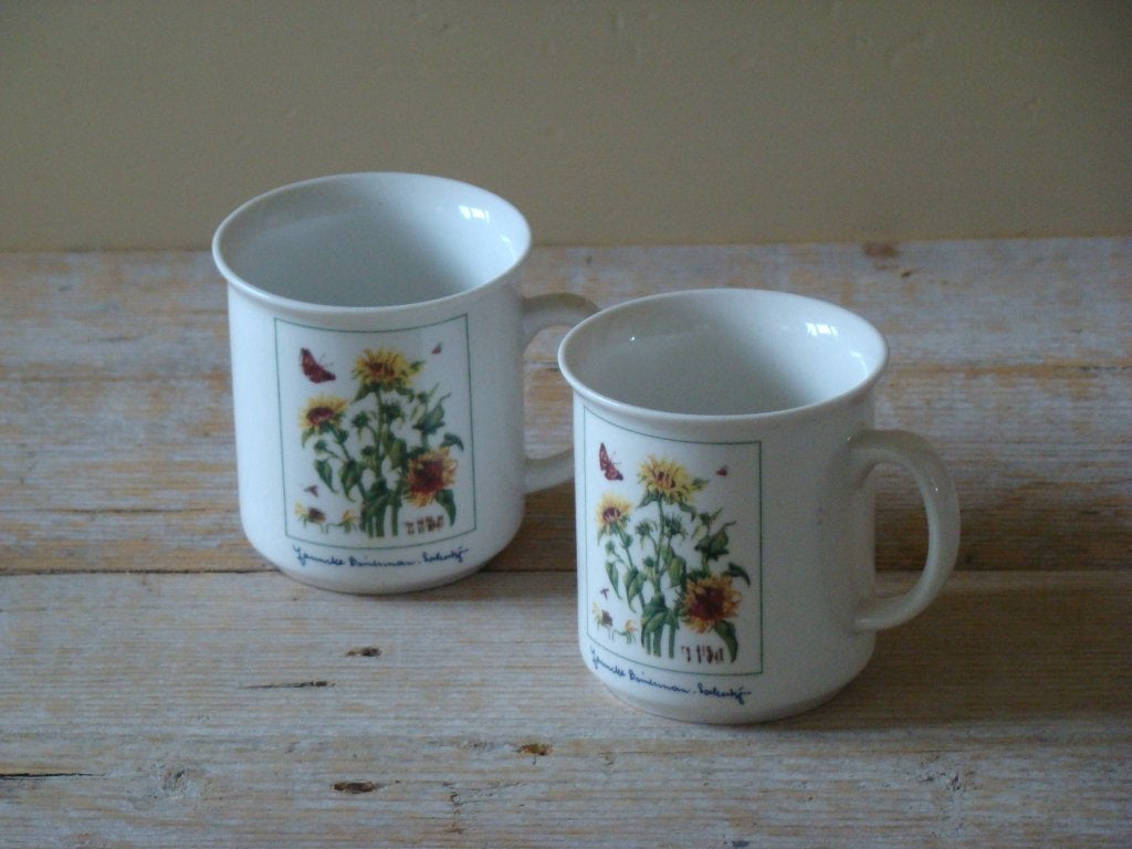 2x Mok Janneke Brinkman ZONNEBLOEMEN, zo goed als nieuw, Huis en Inrichting, Overige merken, Zo goed als nieuw, Overige stijlen