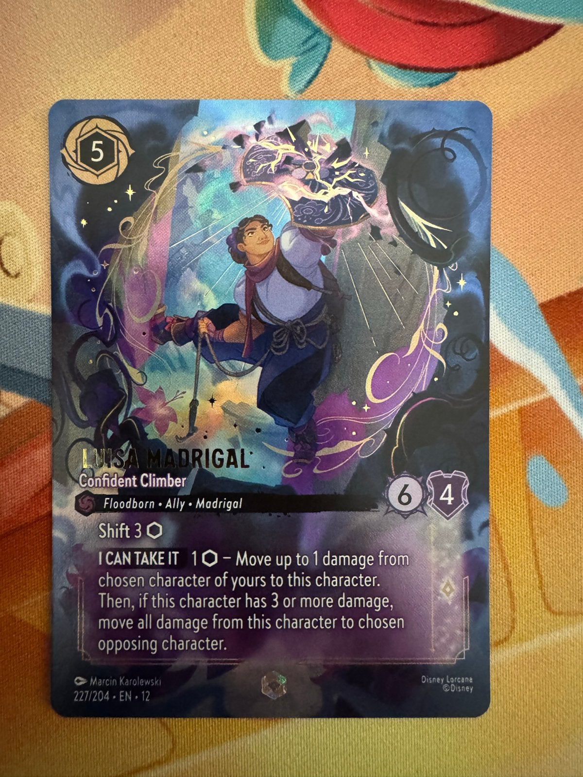 Lorcana Enchanted Luisa Madrigal 227/204 ENG, Ophalen of Verzenden, Zo goed als nieuw, Losse kaart, Foil