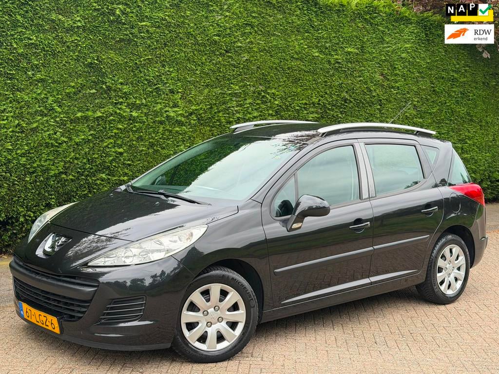 Peugeot 207 SW 1.4 VTi X-line RIJDGOED/AIRCO/CRUISE/APK 7-27, Auto's, Peugeot, Voorwielaandrijving, Stof, Gebruikt, Zwart