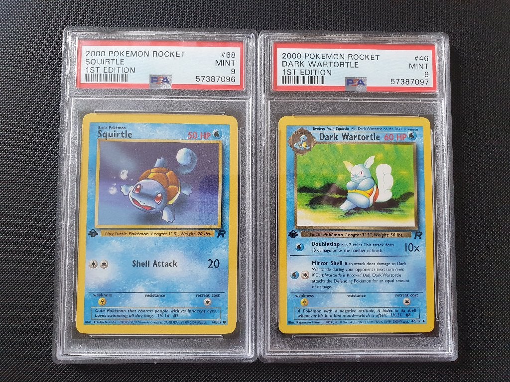 PSA 9 - Squirtle #68 & Dark Wartortle #46 - 1st Edition, Ophalen of Verzenden, Zo goed als nieuw, Meerdere kaarten