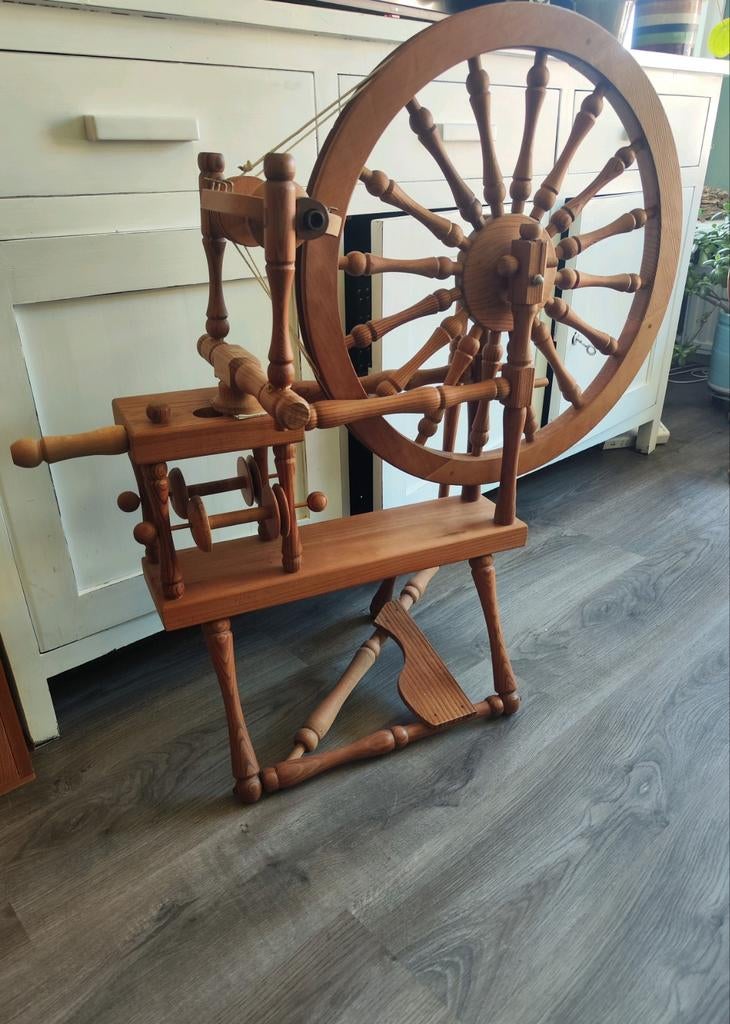 Noors spinnenwiel, Ophalen, Spinwol