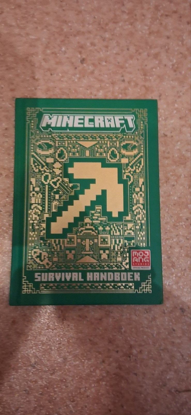 Minecraft Survival Handboek (Nederlandstalig), Ophalen of Verzenden, Zo goed als nieuw, Mojang studio