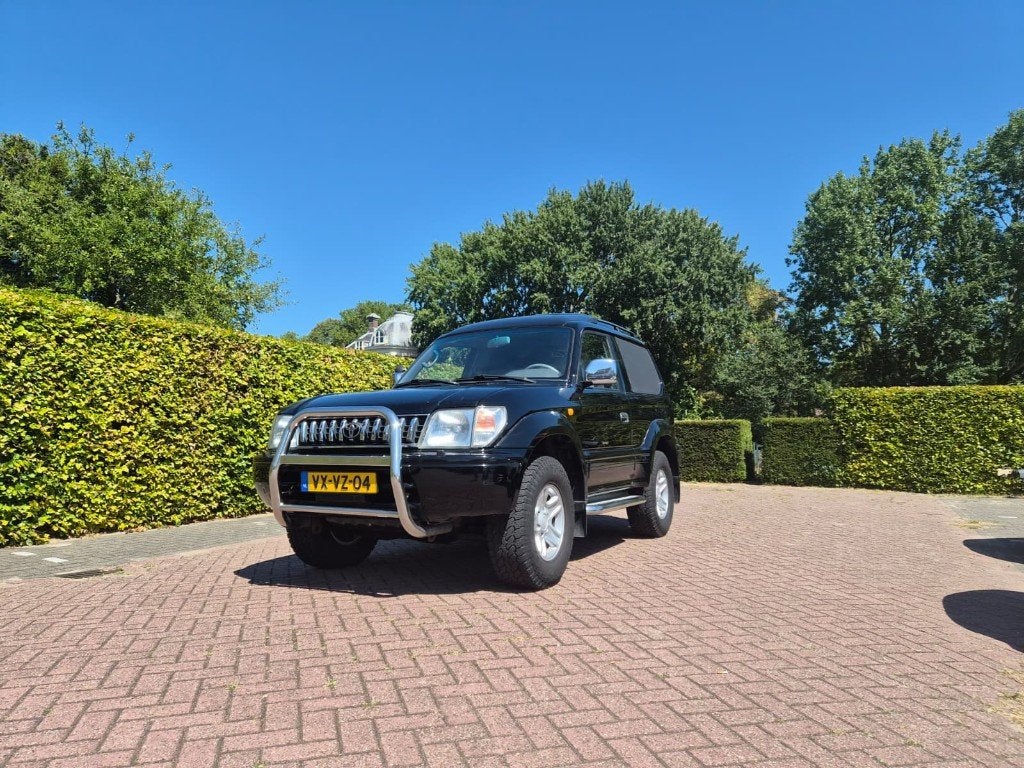 Toyota Land cruiser 90 BENZINE 3.4 V6 AUT landcruiser 1998, Auto's, Bestelauto's, Stof, 2800 kg, Zwart, Origineel Nederlands