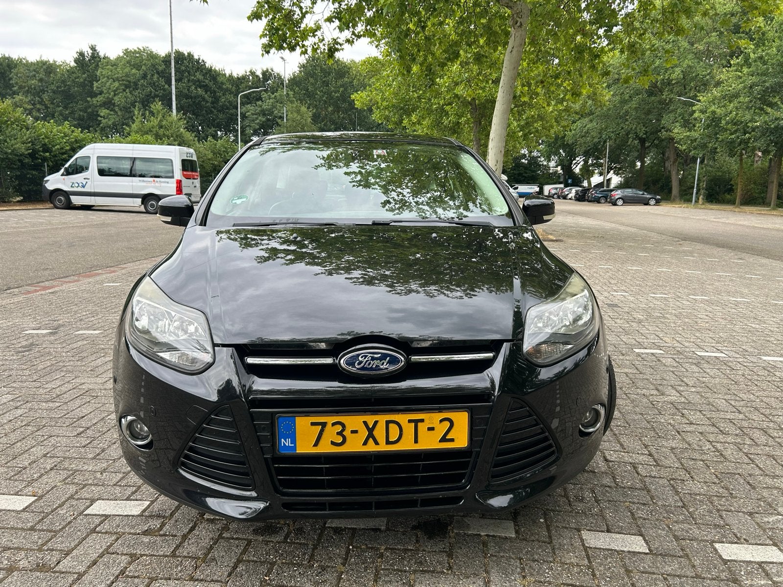 Ford Focus 1.0 Ecoboost 74KW 5-D 2012 Zwart, Auto's, Ford, Stof, Zwart, Bluetooth, 635 kg