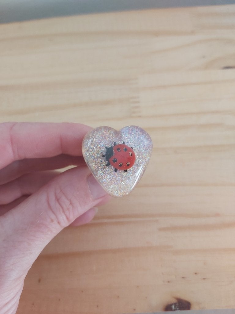 Glitterring met lieveheersbeestje, Ophalen of Verzenden, Zo goed als nieuw, 17 tot 18, Roze