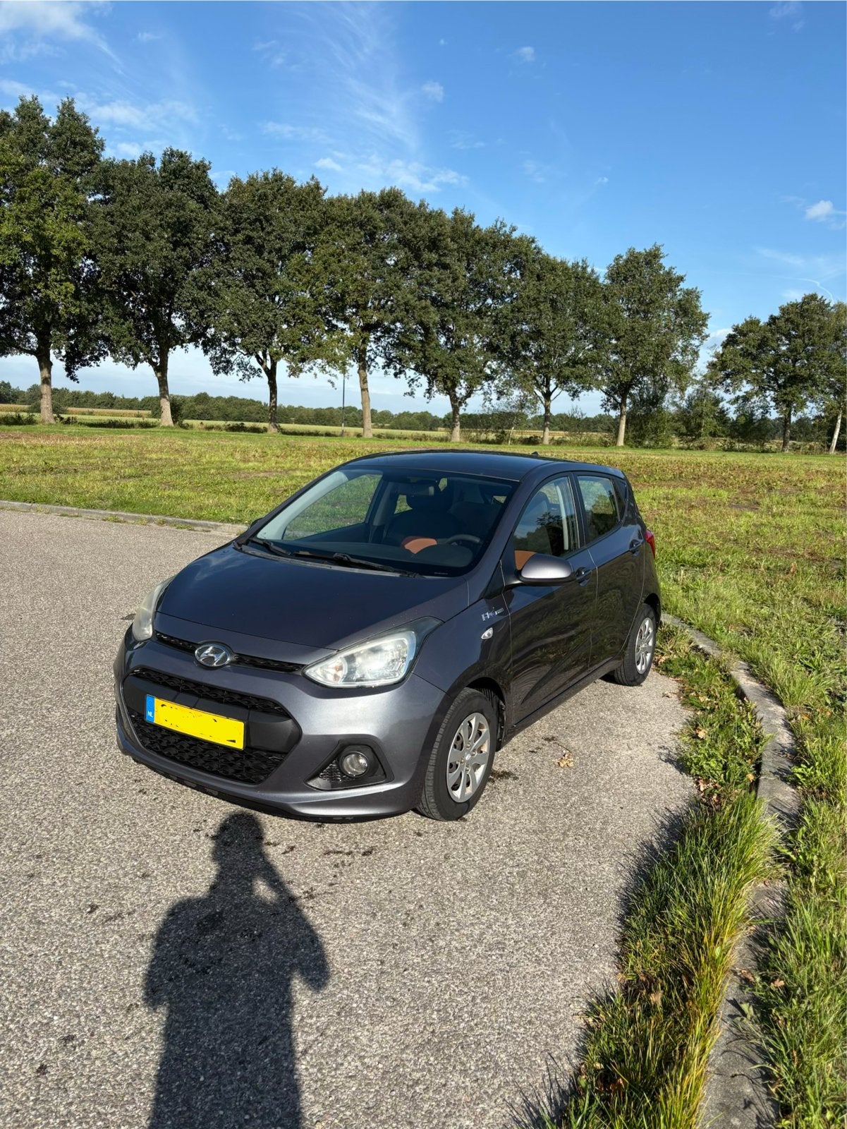 Hyundai i10 1.0 5DR 2015 Grijs, Auto's, 31 €/maand, 4 stoelen, 23 km/l, Origineel Nederlands