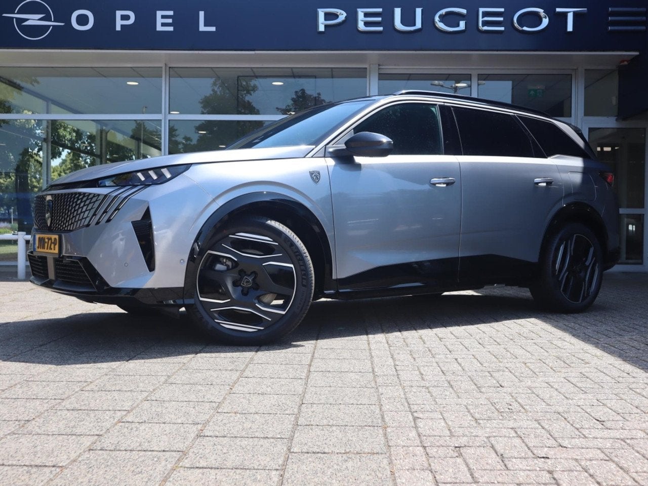 Peugeot E-5008 SUV EV GT Exclusive 73 kWh 210PK 7pers., Rijk, Auto's, Peugeot, Automaat, Gebruikt, 7 stoelen, Leder