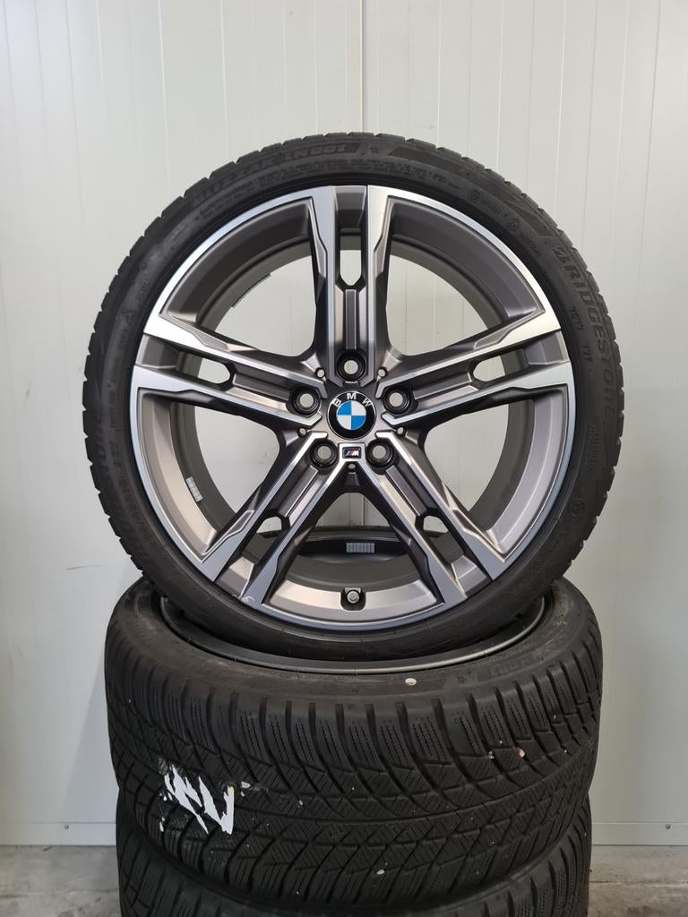18' BMW 1 2 Serie Styling 556M met winterbanden Origineel