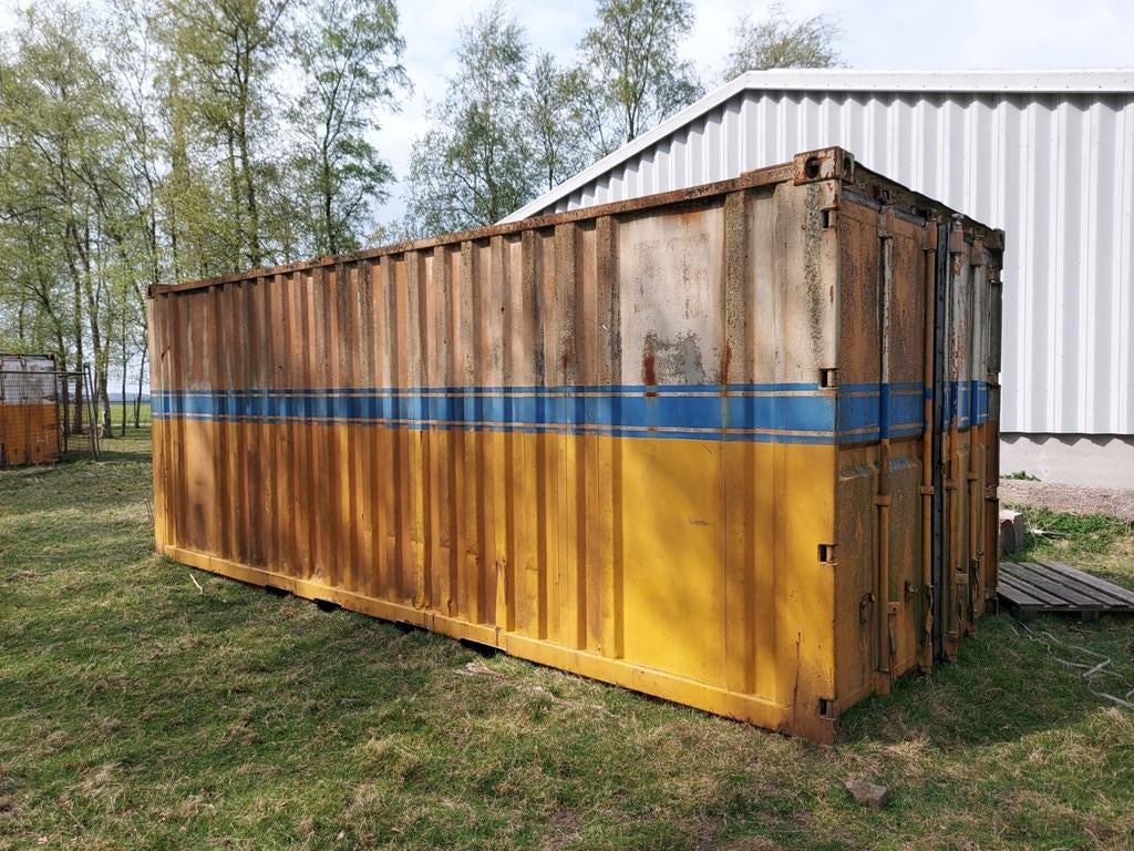 Vier containers en een kantoorunit te koop, Ophalen
