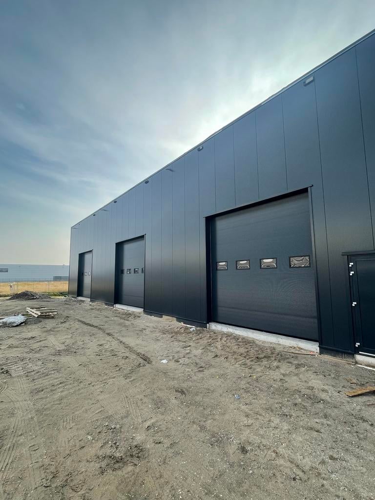 Nieuwe alle maten industriedeuren, overheaddeuren, roldeuren