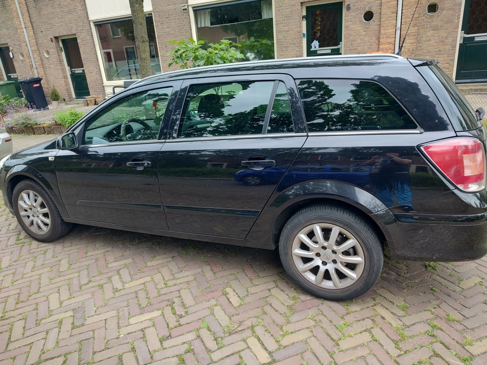 Opel Astra 1.6 16V 85KW St.wgn. 2007 Zwart, Voorwielaandrijving, 657 kg, 4 cilinders, Zwart
