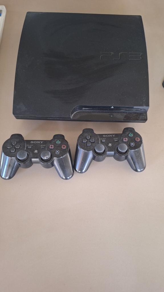 PlayStation 3 Slim met 2 controllers en 12 games, Met 2 controllers, Ophalen of Verzenden, 12 GB, Slim