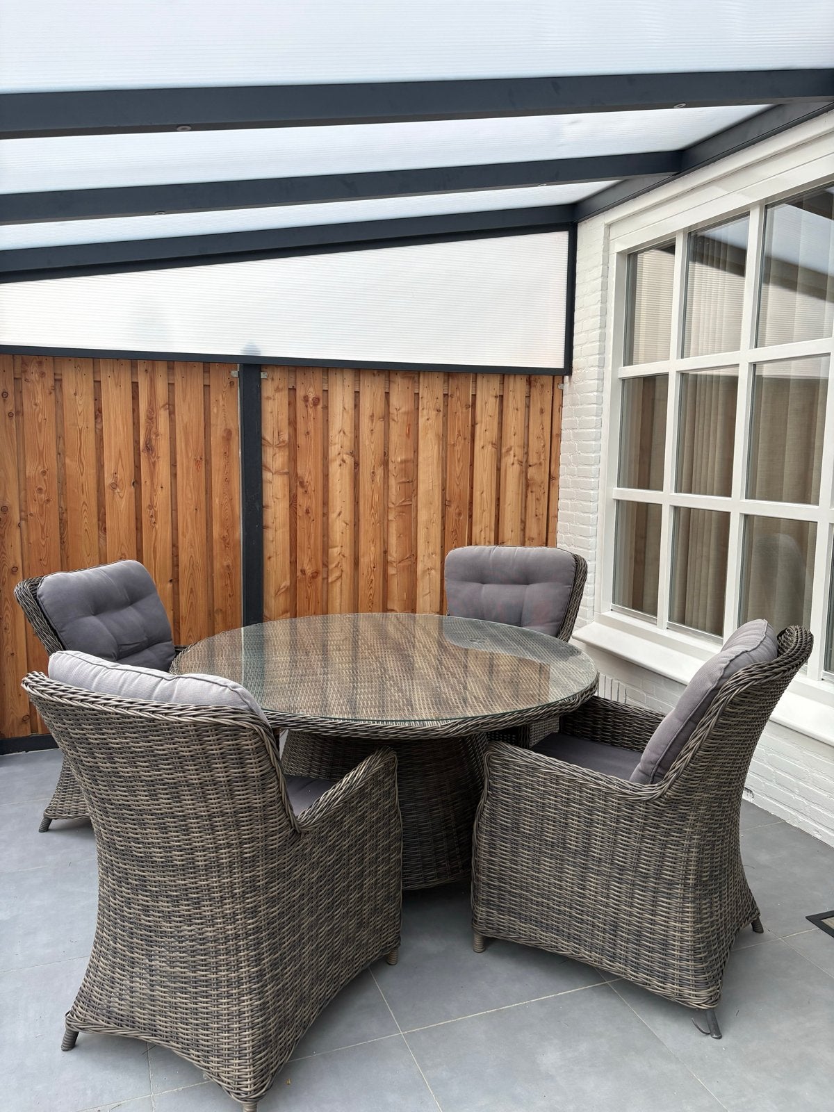 Wicker tuinset met glazen tafel en 4 stoelen, Tuin en Terras, Tuinsets en Loungesets, Ophalen, 4 zitplaatsen, Gebruikt, Eettafel