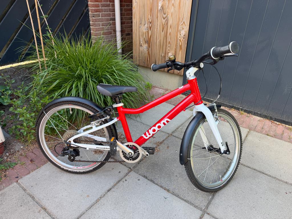 Woom 4 kinderfiets - 20 inch - rood - goede staat, Ophalen, Zo goed als nieuw, Velgrem, 16 tot 20 inch