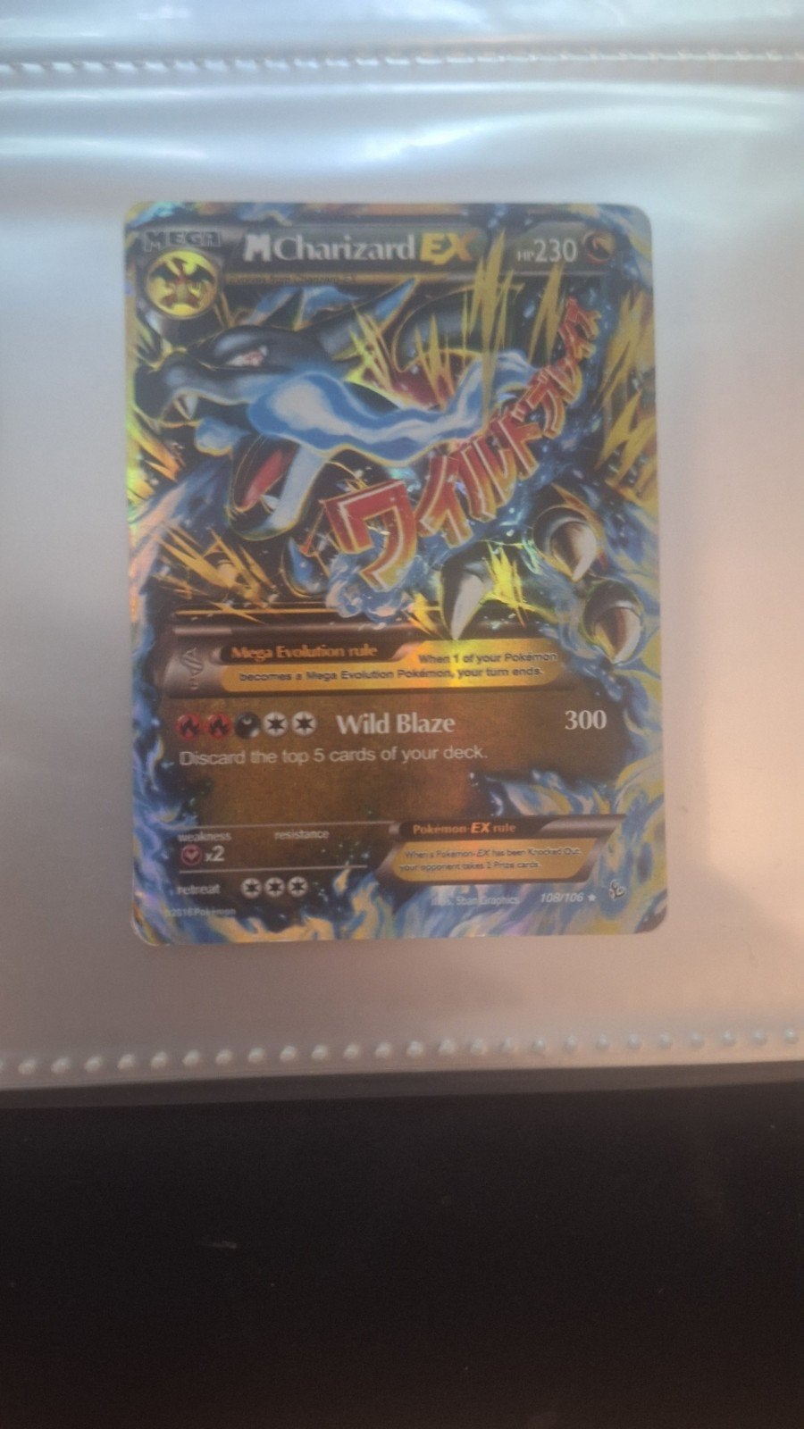 M Charizard EX Pokémon Kaart 108/106, Ophalen of Verzenden, Zo goed als nieuw, Losse kaart, Foil