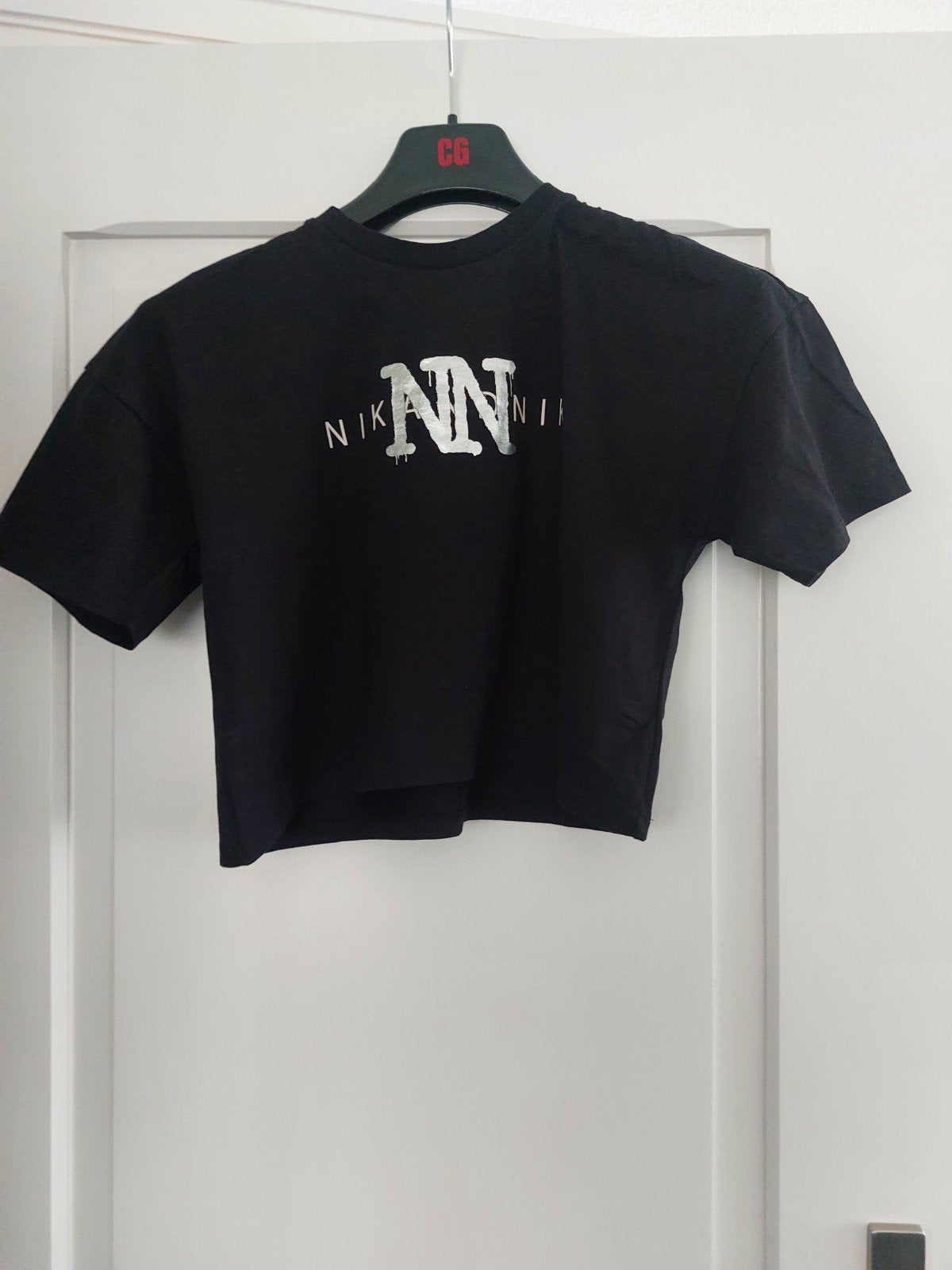 Zwart Nik&Nik shirt maat 176 (zilver 2 grote NN), Kinderen en Baby's, Kinderkleding | Maat 176, Meisje, Nik&Nik, Ophalen of Verzenden