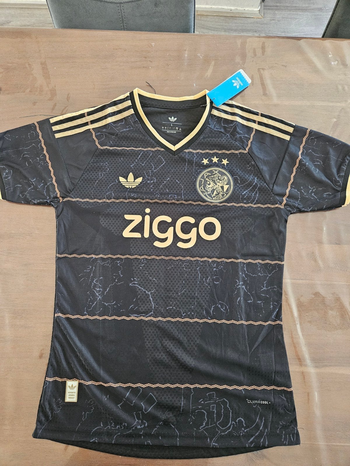 Ajax uitshirt 2026-2027, Maat 52/54 (L), Zwart, Nieuw, Ophalen of Verzenden
