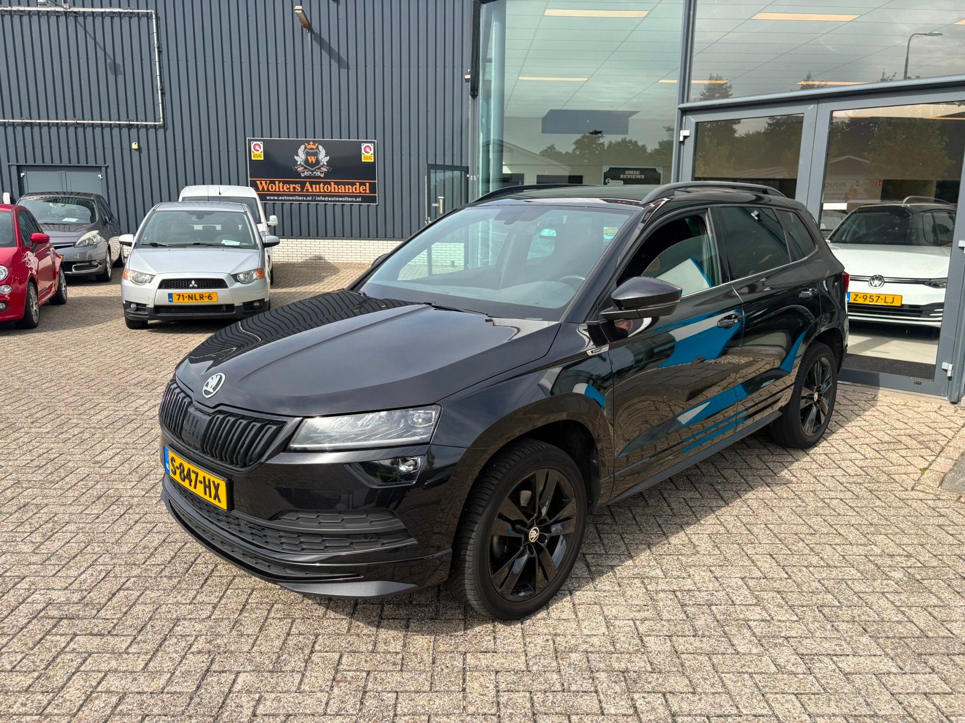 Skoda Karoq 1.5 TSI ACT Sportline Business, 4 cilinders, Zwart, Karoq, Bedrijf