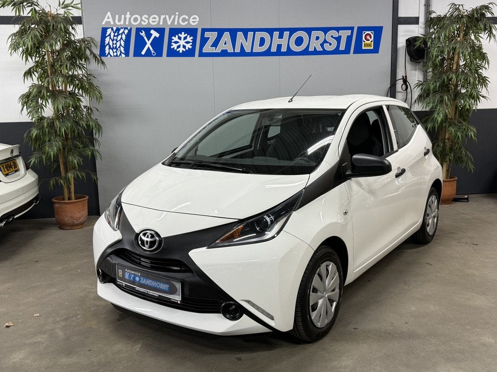 Toyota Aygo 1.0 VVT-i x-now // Airco // el. ramen (bj 2017), Auto's, Toyota, Voorwielaandrijving, Stof, Gebruikt, Euro 6