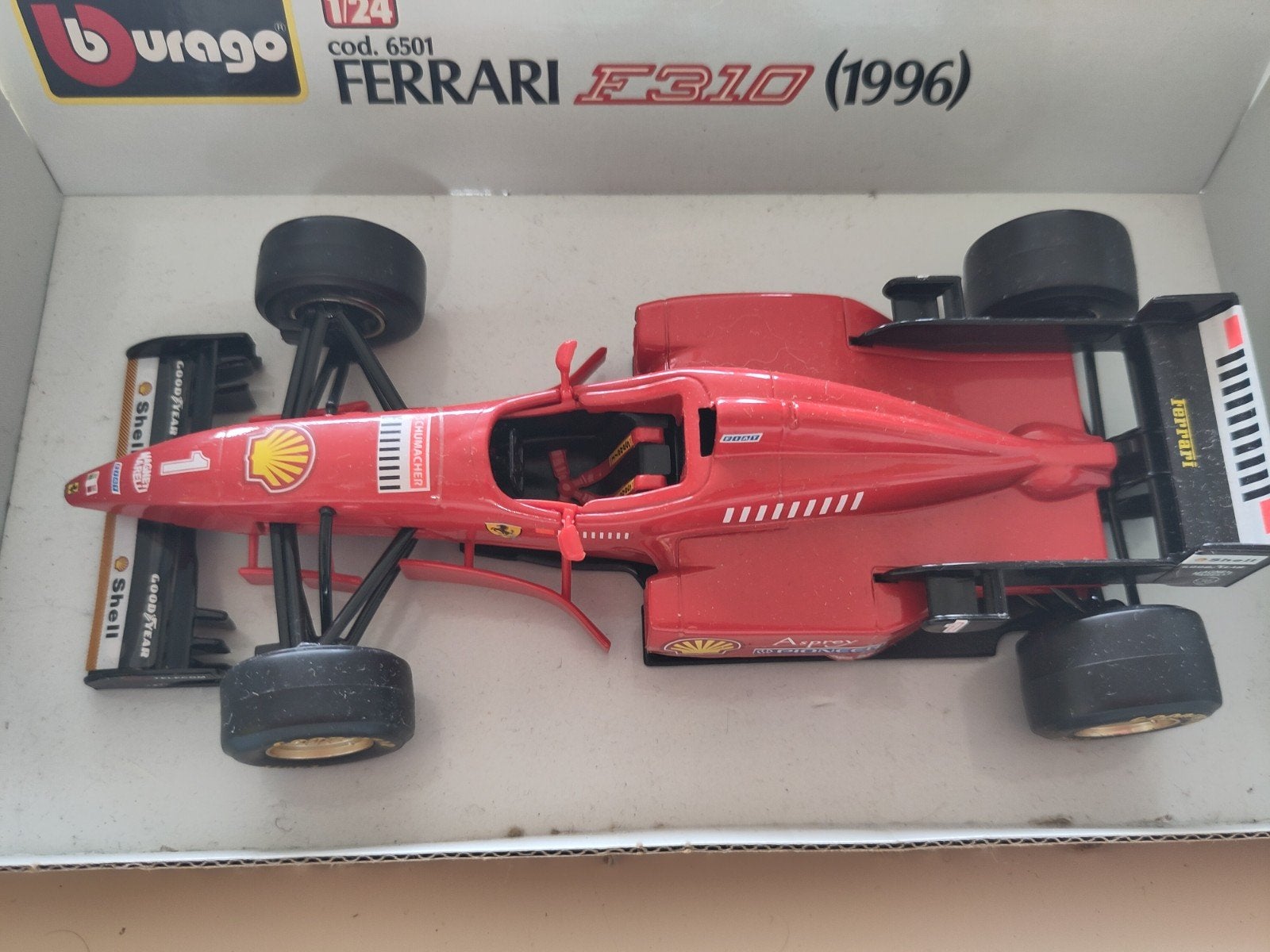 Burago Ferrari F310 (1996) 1:24 modelauto, Ophalen of Verzenden, Zo goed als nieuw, Auto
