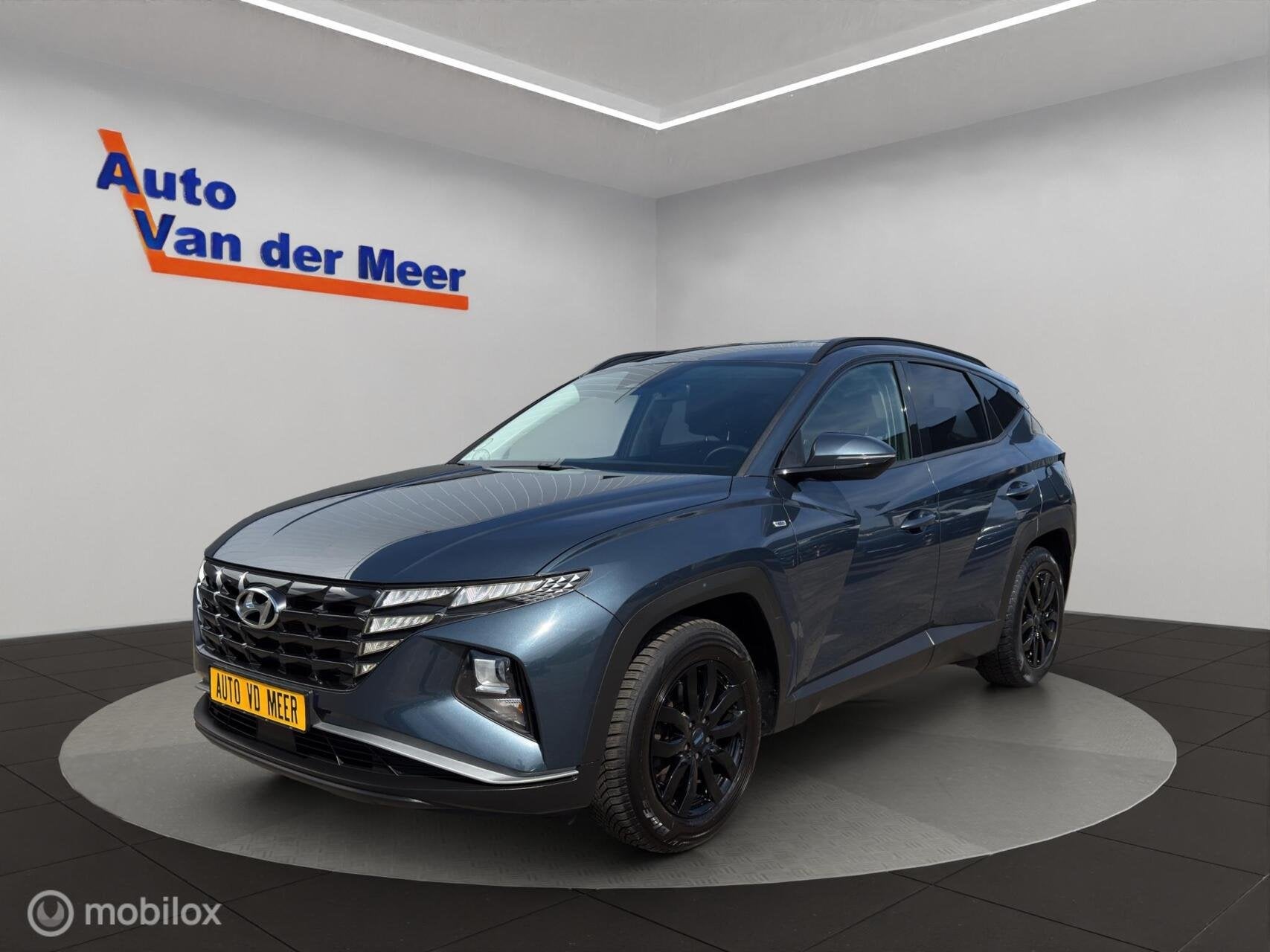 Hyundai Tucson 1.6 T-GDI MHEV Comfort, Auto's, Stof, Gebruikt, 4 cilinders, Blauw