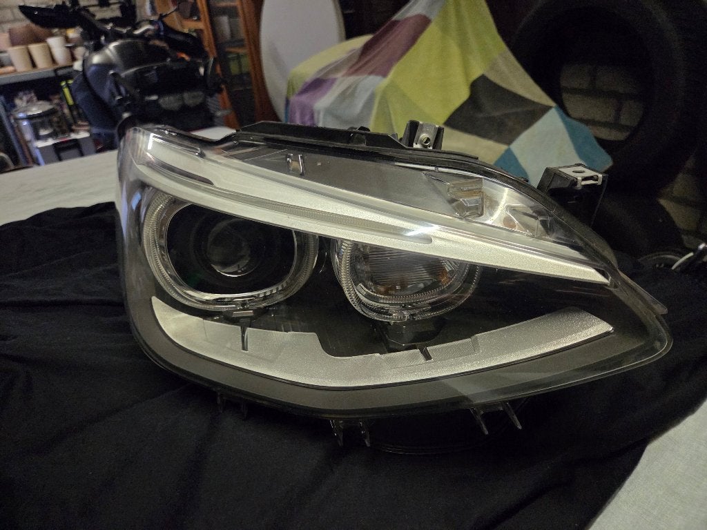 Koplamp BMW 1-serie rechts (HELLA E1 3132) - vochtprobleem, Ophalen, Gebruikt, BMW