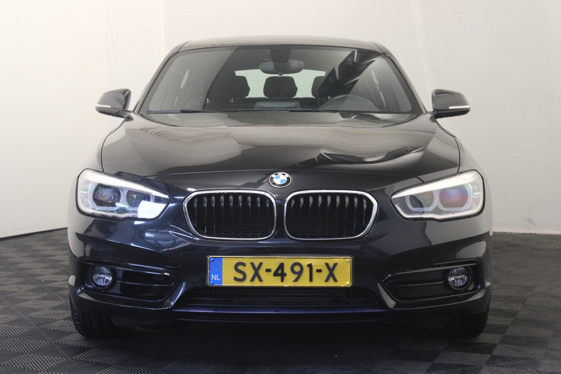 BMW 1-serie 118i Corporate Lease Executive (bj 2018), Auto's, Gebruikt, Zwart, Bedrijf, 650 kg