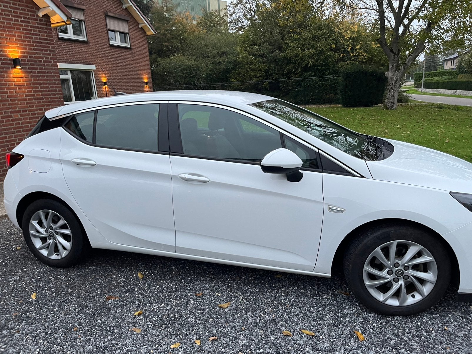 Opel Astra 2021 – 105.000 km – Eerste eigenaar - BTW-auto, Auto's, Voorwielaandrijving, 1199 cc, Alcantara, Wit