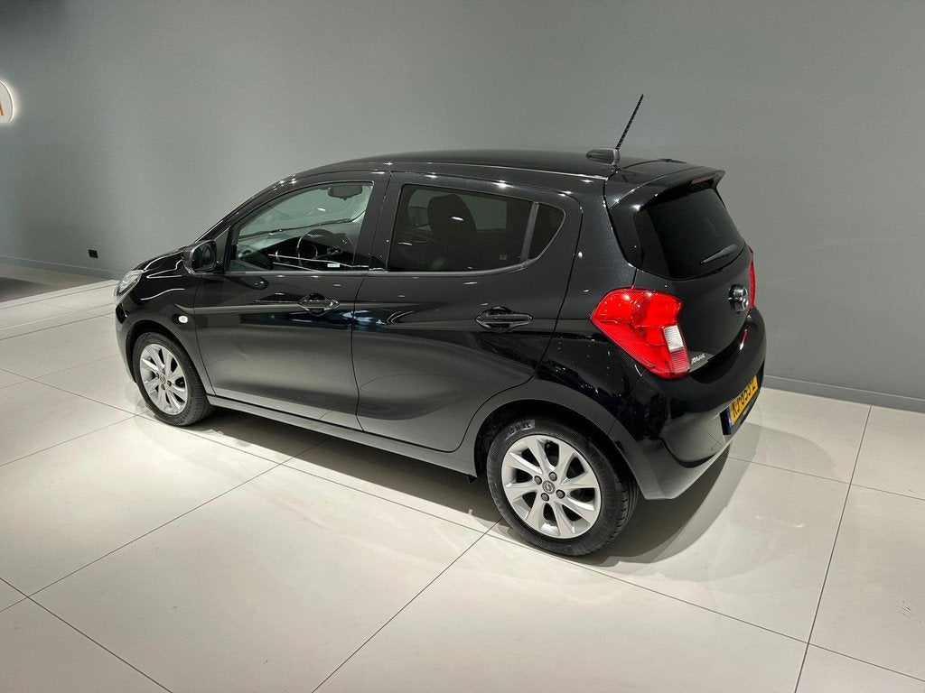 Opel Karl 1.0 ecoFLEX 75pk Cosmo Leer/ Clima/ Cruise/ LM, Auto's, Opel, Gebruikt, Leder en Stof, Zwart, Origineel Nederlands