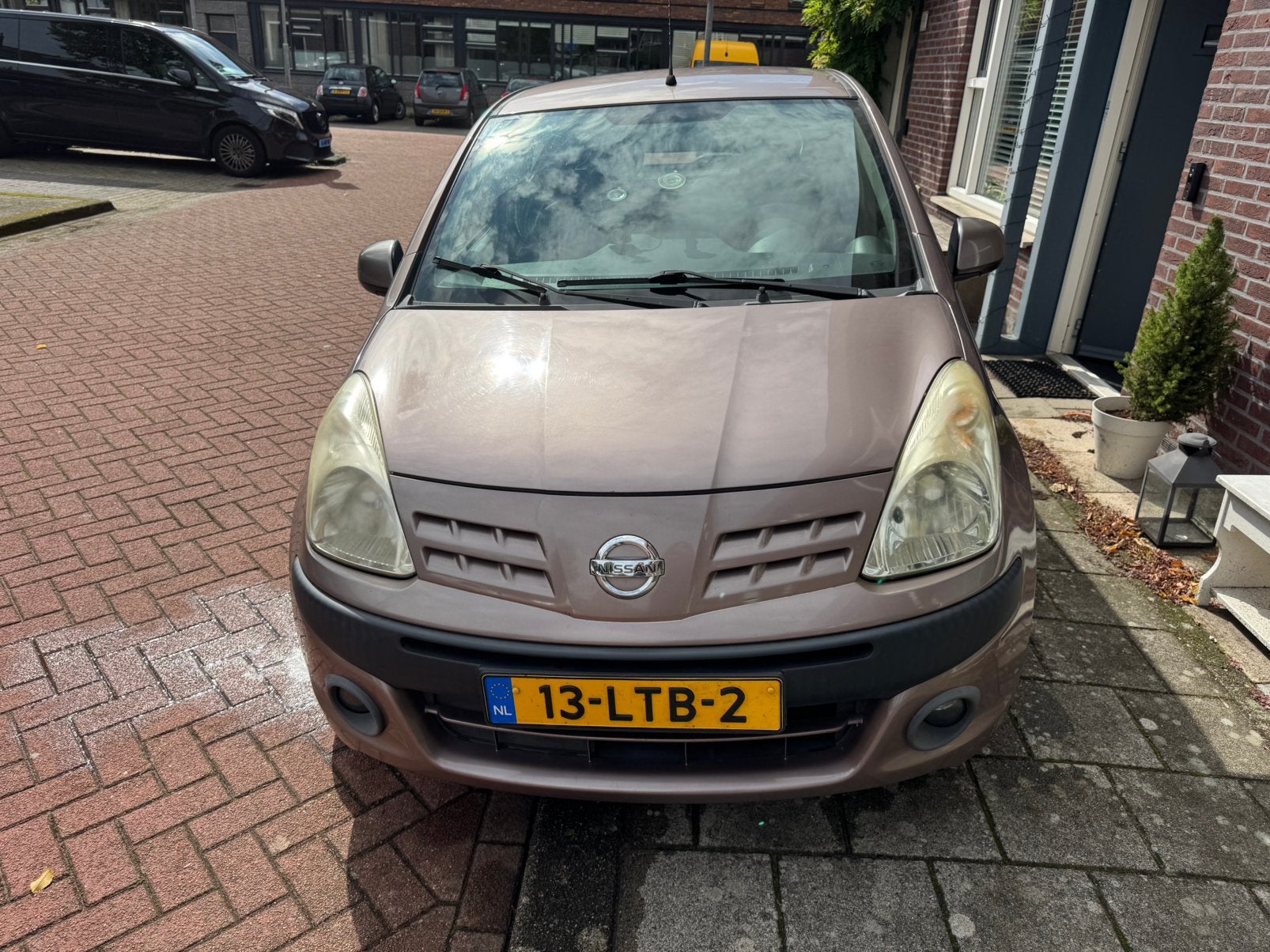 Nissan Pixo 1.0 50KW 5D 2010 Beige, Auto's, Voorwielaandrijving, Stof, 200 kg, 4 stoelen