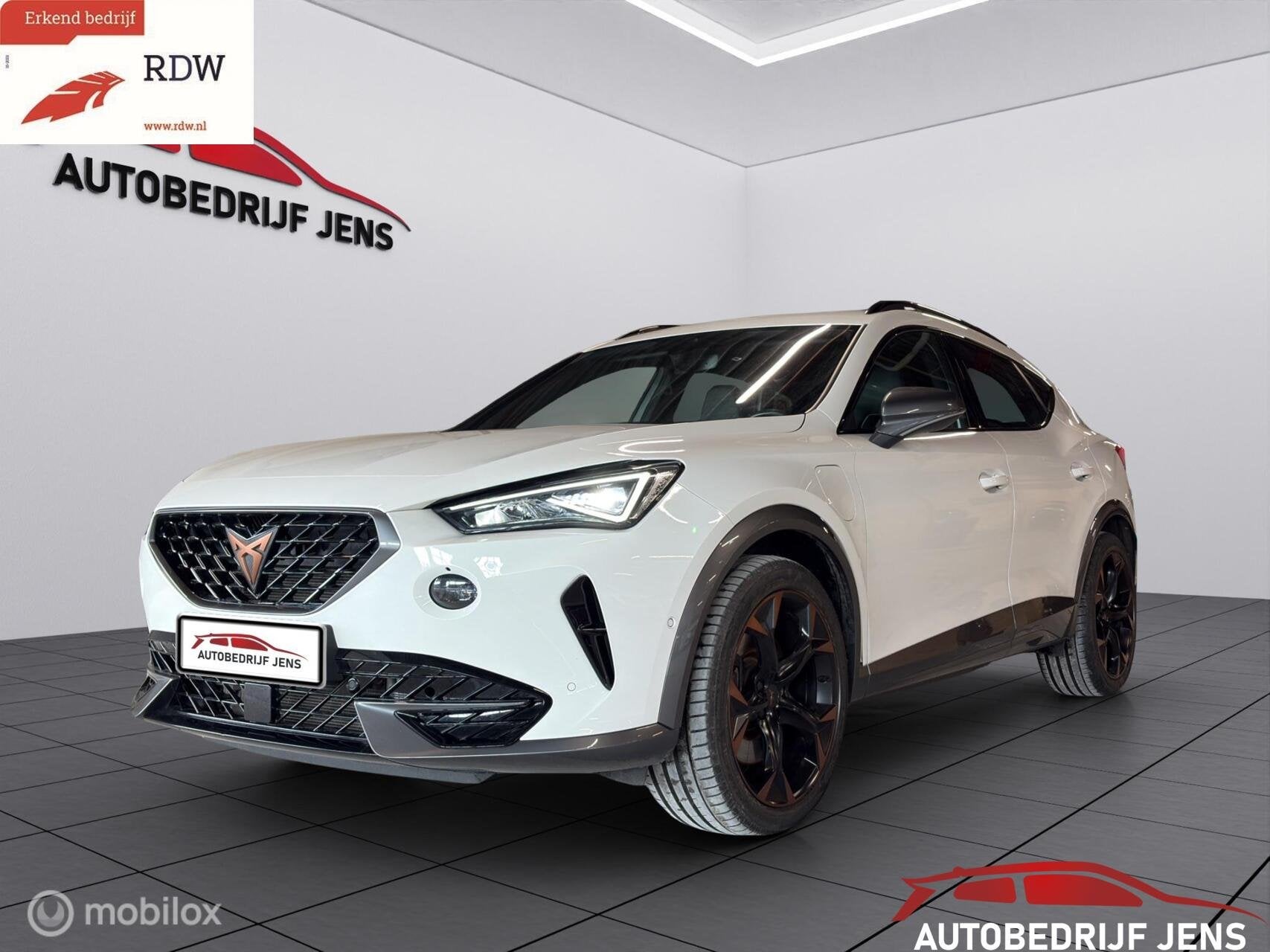 CUPRA Formentor 1.4 e-Hybrid VZ Copper Edition|PANO|st. memo, Auto's, Gebruikt, 4 cilinders, Formentor, Verwarmde buitenspiegels