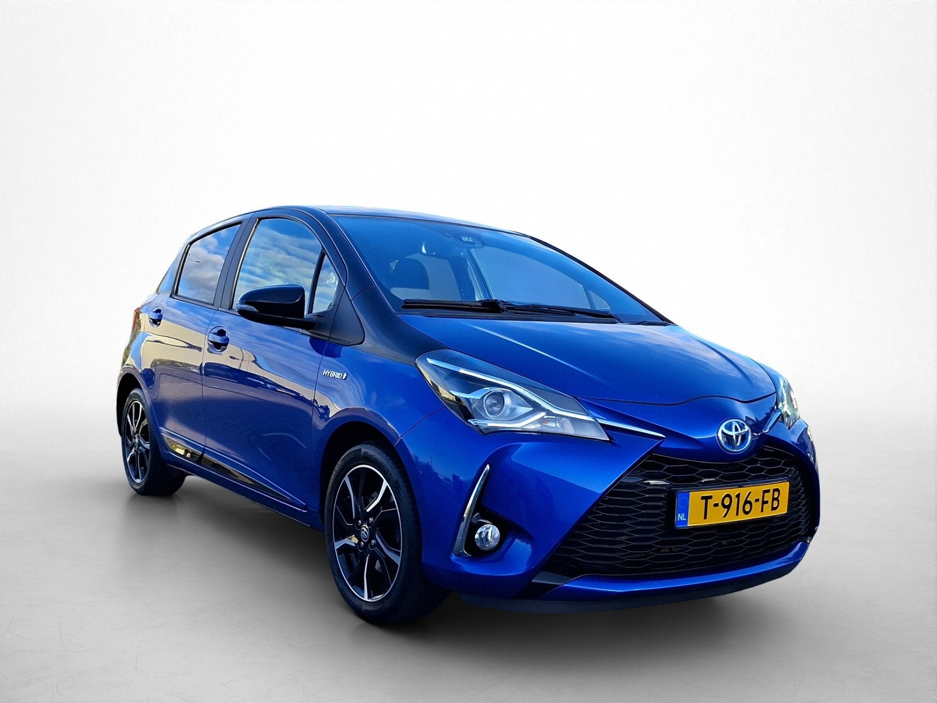 Toyota Yaris 1.5 Hybrid Bi-Tone | Dealer onderhouden | Stoel, 12 maanden, Gebruikt, 4 cilinders, Blauw