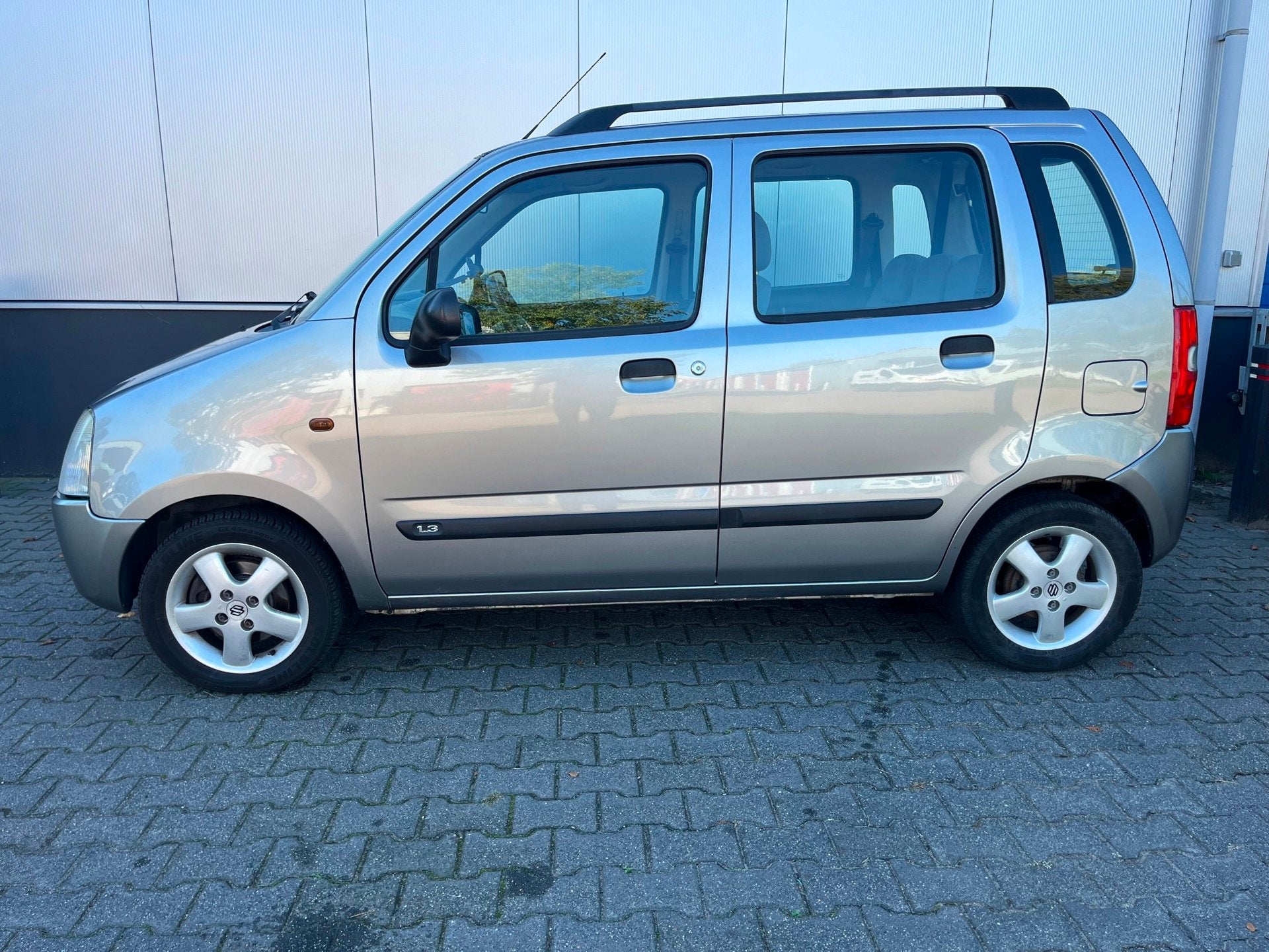 Suzuki Wagon R+ 1.3 94pk FreeStyle Automaat / Airco / Cruise, Auto's, Stof, Wagon R+, Bedrijf, Grijs