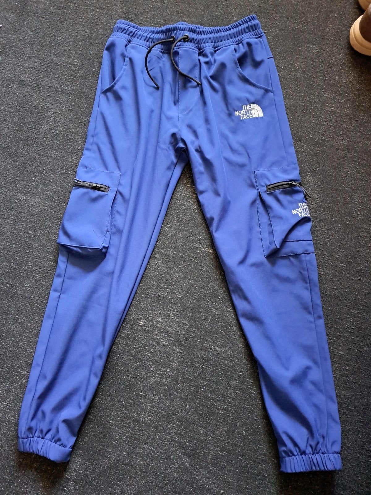 Super mooie north face cargo broek maat xl, Ophalen, Blauw, Overige typen, Maat 56/58 (XL)